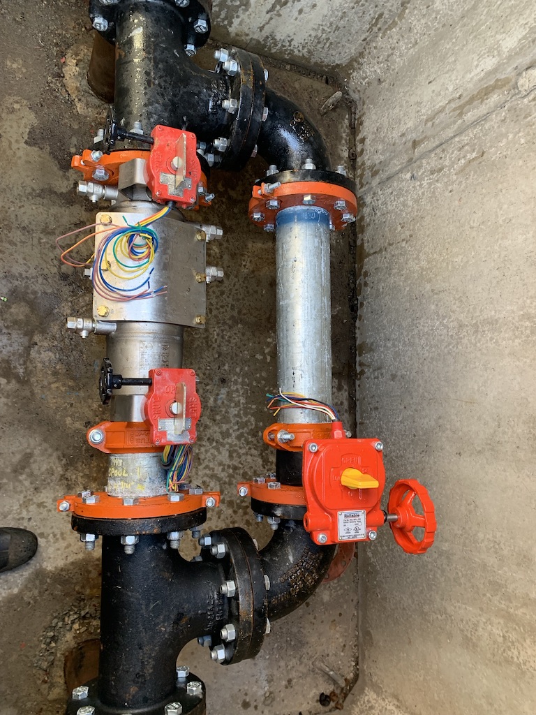 Backflow prevention assembly installed in vault